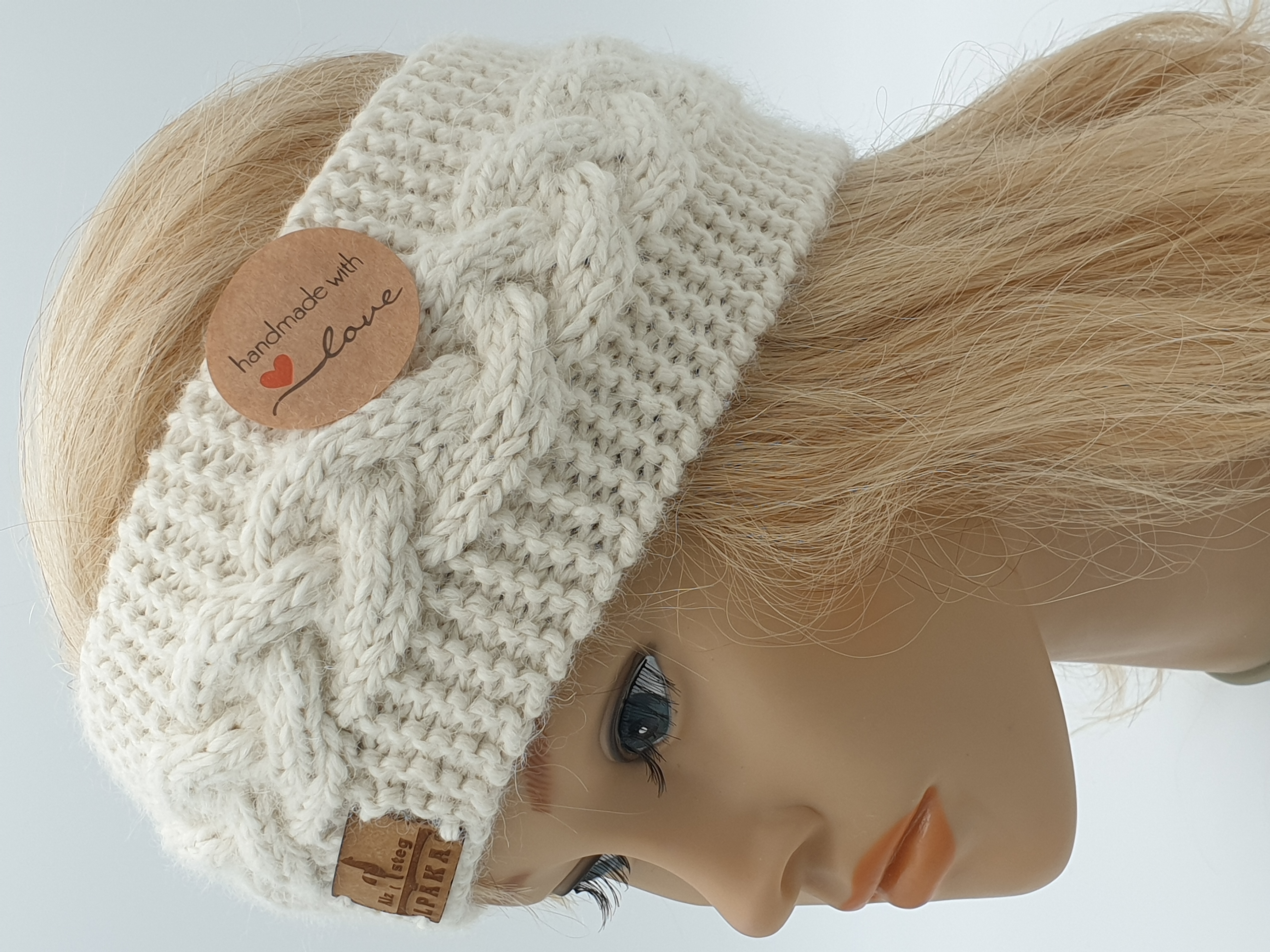 Stirnband aus Alpakawolle im Zopfmusterdesign in vielen verschiedenen Farben Stirnband aus Alpakawolle im Zopfmusterdesign in vielen verschiedenen Farben